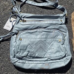 This Mudd Topaz Topstitch Washed Passport Crossbody bag
